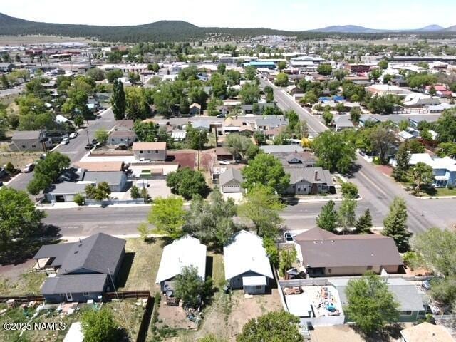 417, 429 W Sheridan Ave, Williams, AZ 86046 - aerial perspective of suburban area with a mountainous background