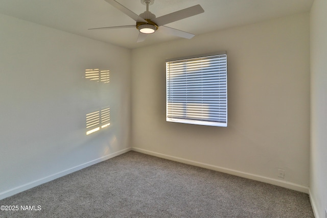 1009 Bales Ave, Winslow, AZ 86047 - spare room with carpet, baseboards, and ceiling fan
