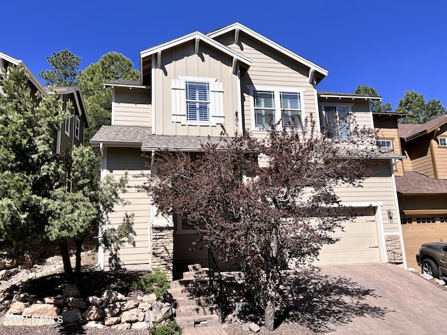 view of front of property featuring a garage