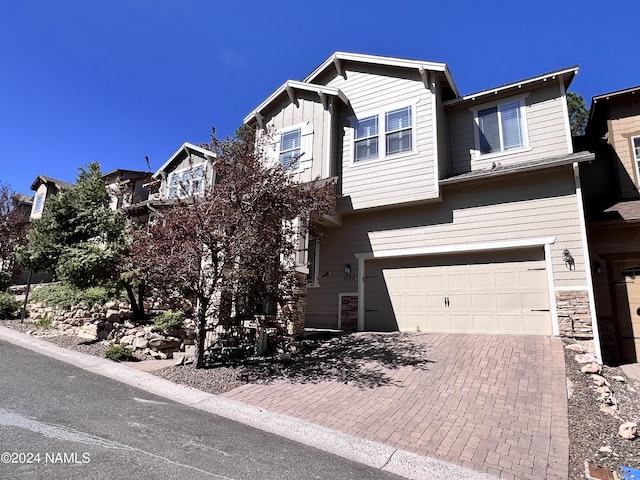 view of front of home with a garage