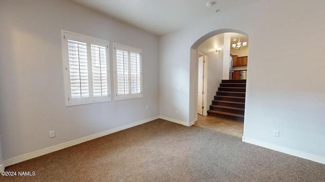 view of carpeted spare room