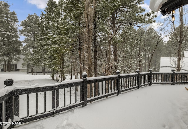 view of snow covered patio