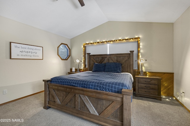 bedroom with carpet, vaulted ceiling, baseboards, and ceiling fan