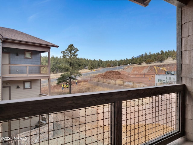 balcony featuring a rural view