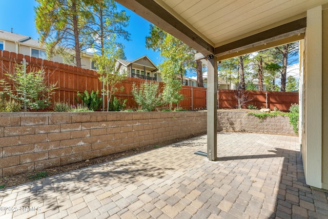 3223 S Beringer Ln, Flagstaff, AZ 86005 - fenced backyard with a patio