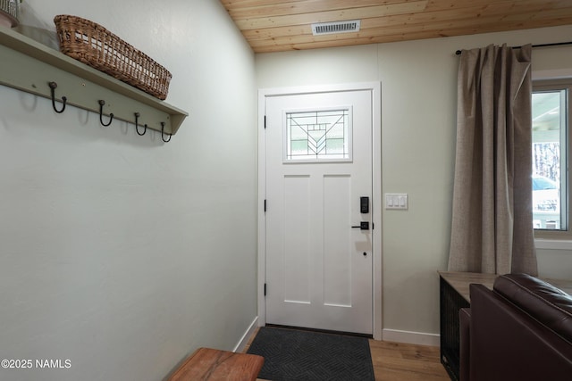 doorway to outside with wood ceiling and hardwood / wood-style floors