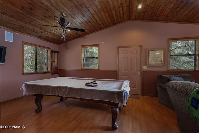 rec room with lofted ceiling, healthy amount of natural light, wood finished floors, pool table, and wood ceiling