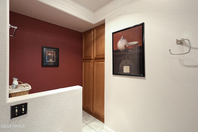 hall with light tile patterned flooring