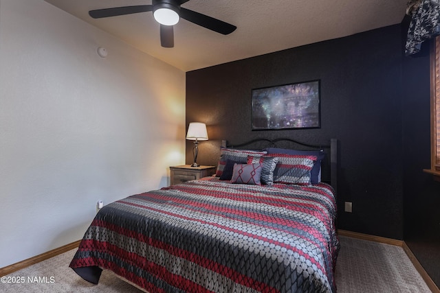 bedroom with carpet, baseboards, and ceiling fan