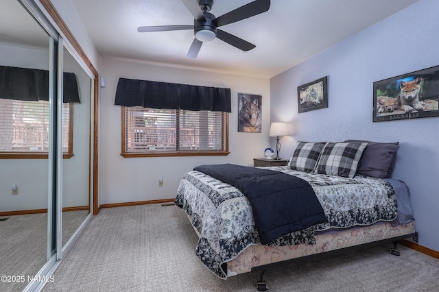 bedroom with carpet flooring, multiple windows, and a closet
