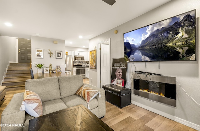 living room featuring light wood-type flooring