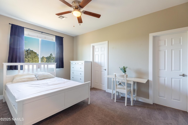 2553 W Cripple Creek Dr, Flagstaff, AZ 86001 - carpeted bedroom featuring baseboards and ceiling fan