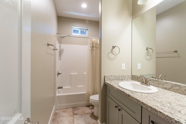 2553 W Cripple Creek Dr, Flagstaff, AZ 86001 - bathroom with vanity, toilet, shower / bath combo with shower curtain, and tile patterned floors