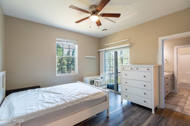 2553 W Cripple Creek Dr, Flagstaff, AZ 86001 - bedroom featuring multiple windows, dark wood-type flooring, and a ceiling fan