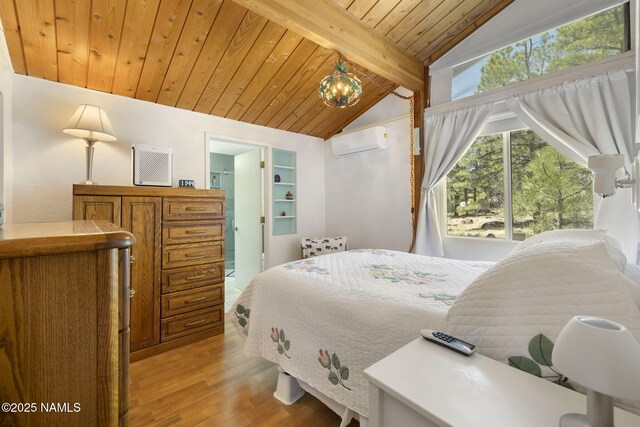 655 E Trout Creek Rd, Munds Park, AZ 86017 - bedroom with a wall mounted AC, light wood-type flooring, and wooden ceiling