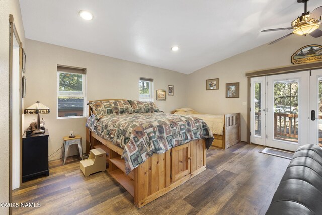 655 E Trout Creek Rd, Munds Park, AZ 86017 - bedroom with access to exterior, dark wood-style flooring, lofted ceiling, multiple windows, and ceiling fan