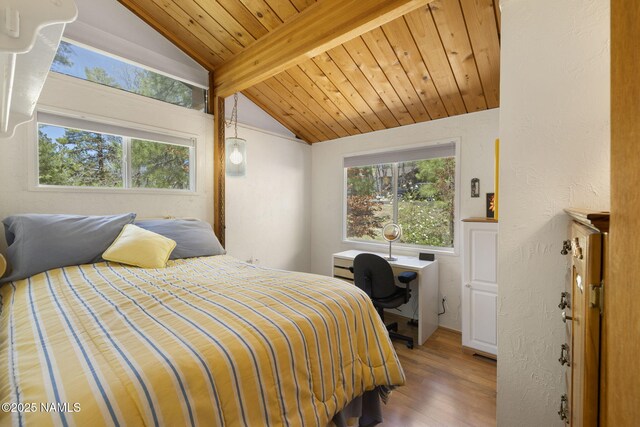 655 E Trout Creek Rd, Munds Park, AZ 86017 - bedroom featuring multiple windows, wood finished floors, wooden ceiling, and a desk