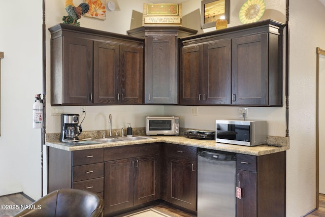 655 E Trout Creek Rd, Munds Park, AZ 86017 - kitchen featuring stainless steel microwave, a sink, dark brown cabinetry, and dishwasher