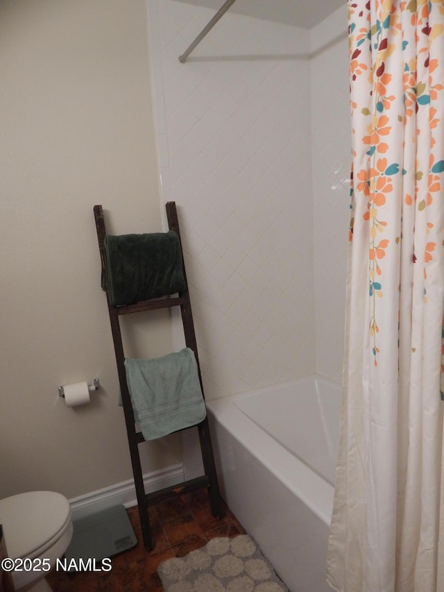 1000 N Beaver St Unit 116, Flagstaff, AZ 86001 - bathroom featuring toilet and shower / tub combo with curtain