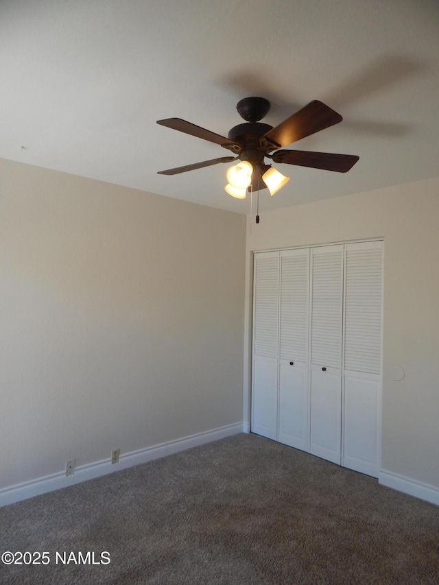 1000 N Beaver St Unit 116, Flagstaff, AZ 86001 - unfurnished bedroom featuring carpet floors, a closet, and ceiling fan