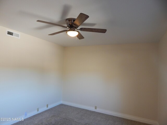1000 N Beaver St Unit 116, Flagstaff, AZ 86001 - unfurnished room with dark colored carpet and a ceiling fan