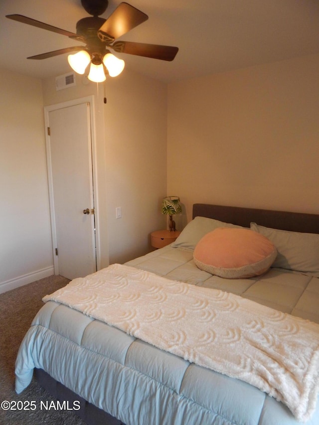 1000 N Beaver St Unit 116, Flagstaff, AZ 86001 - bedroom featuring baseboards, a ceiling fan, carpet flooring, and visible vents