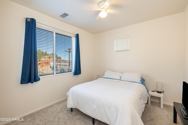 1650 E Ponderosa Pkwy Unit 3213, Flagstaff, AZ 86001 - carpeted bedroom with baseboards and ceiling fan