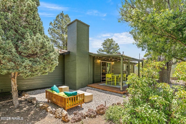 rear view of house with a deck