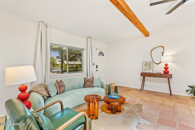 living room with beamed ceiling and ceiling fan