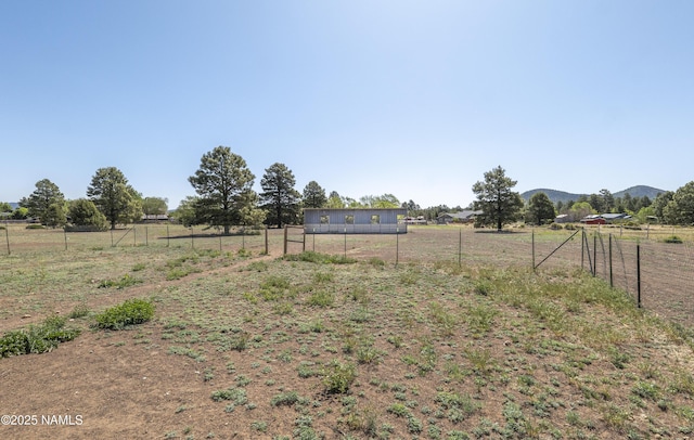 7815 Prairie Dog Ln, Flagstaff, AZ 86004 - view of yard with a view of countryside and a mountain view