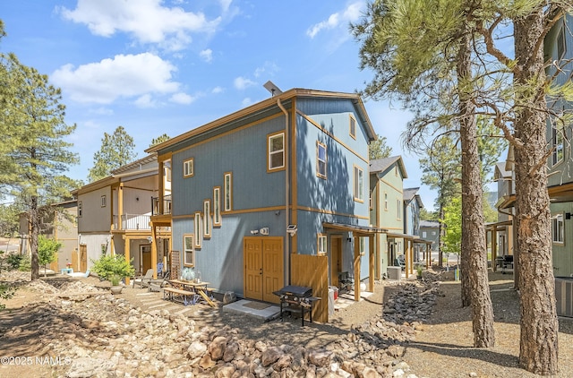 3001 E Butler Ave Unit 21, Flagstaff, AZ 86004 - rear view of house featuring a residential view and a balcony