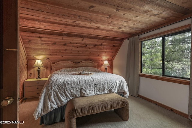 bedroom featuring light carpet, wooden ceiling, baseboards, and vaulted ceiling