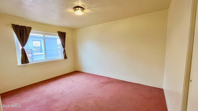 401 N Kinsley Ave, Winslow, AZ 86047 - spare room with carpet flooring