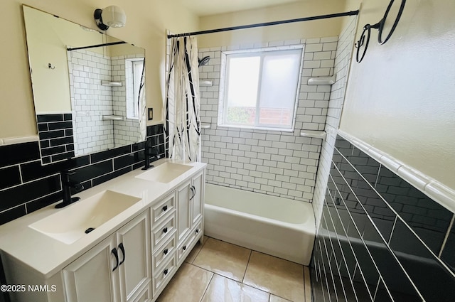 401 N Kinsley Ave, Winslow, AZ 86047 - bathroom featuring tile patterned floors, shower / bath combination with curtain, double vanity, and wainscoting
