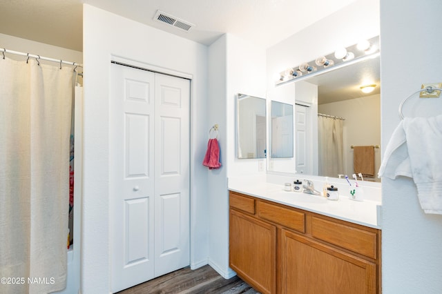 4551 E Allison Dr, Flagstaff, AZ 86004 - bathroom with hardwood / wood-style flooring and vanity