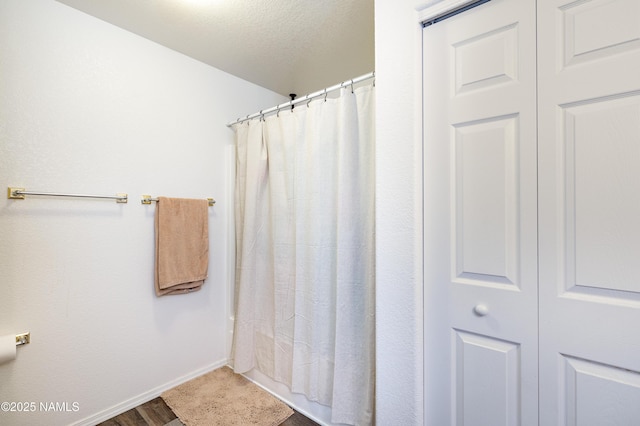 4551 E Allison Dr, Flagstaff, AZ 86004 - bathroom with a textured ceiling and a shower with curtain