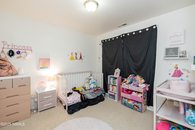 4551 E Allison Dr, Flagstaff, AZ 86004 - carpeted bedroom with a crib