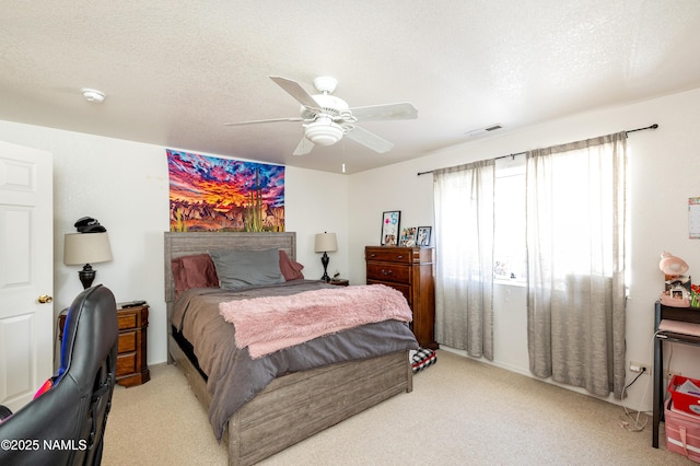 4551 E Allison Dr, Flagstaff, AZ 86004 - bedroom featuring ceiling fan, light colored carpet, and a textured ceiling