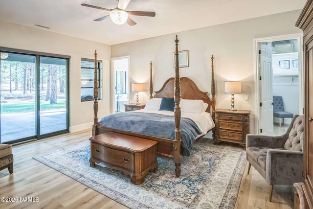 3605 N Langdale Trl, Flagstaff, AZ 86001 - bedroom with access to exterior, light wood finished floors, baseboards, and a ceiling fan