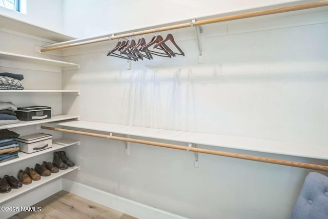 3605 N Langdale Trl, Flagstaff, AZ 86001 - spacious closet featuring wood finished floors