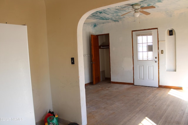 entryway featuring ceiling fan and light hardwood / wood-style flooring