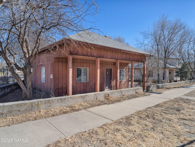 view of home's exterior with covered porch