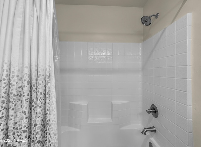 room details featuring shower / bath combo with shower curtain