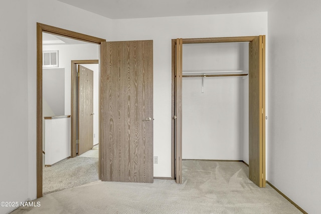 501 W Santa Fe Ave Unit 28, Flagstaff, AZ 86001 - unfurnished bedroom featuring carpet and a closet