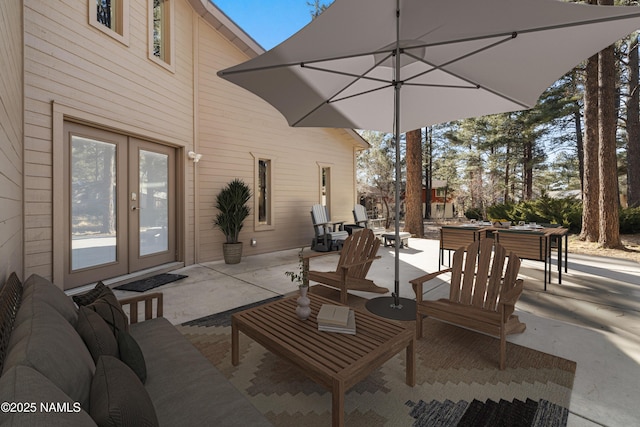 1420 N Royal Oaks Way, Flagstaff, AZ 86004 - view of patio / terrace with french doors and outdoor dining space