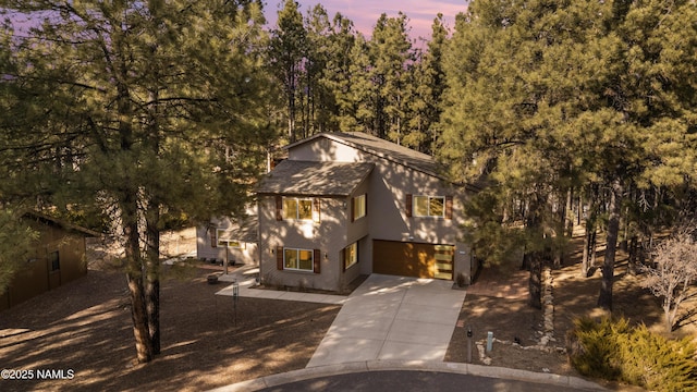 1420 N Royal Oaks Way, Flagstaff, AZ 86004 - view of front of house with driveway and an attached garage