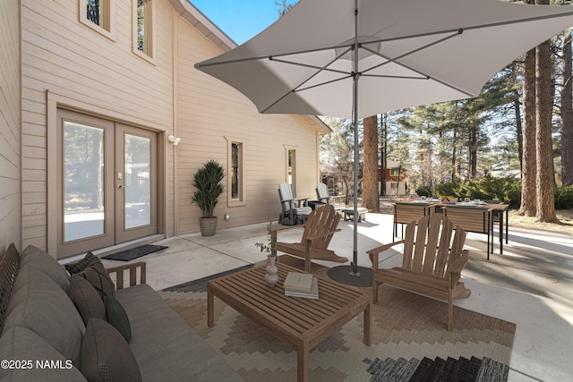 1420 N Royal Oaks Way, Flagstaff, AZ 86004 - view of patio featuring french doors and outdoor dining area