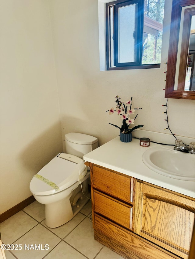 5070 N Weatherford Rd, Flagstaff, AZ 86001 - half bathroom with vanity and tile patterned floors