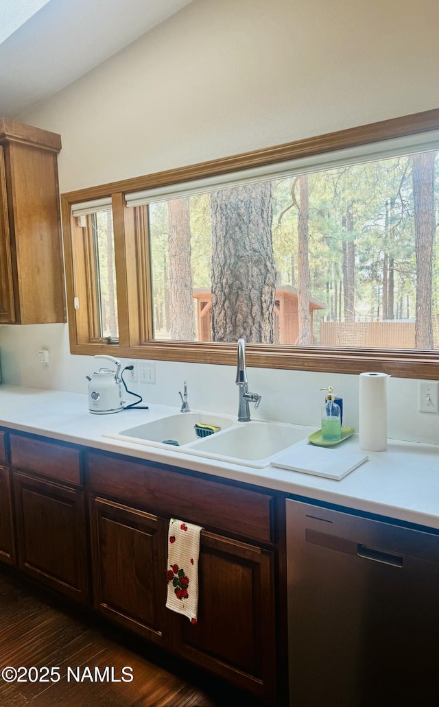 5070 N Weatherford Rd, Flagstaff, AZ 86001 - kitchen with dishwasher, light countertops, and dark wood-style flooring
