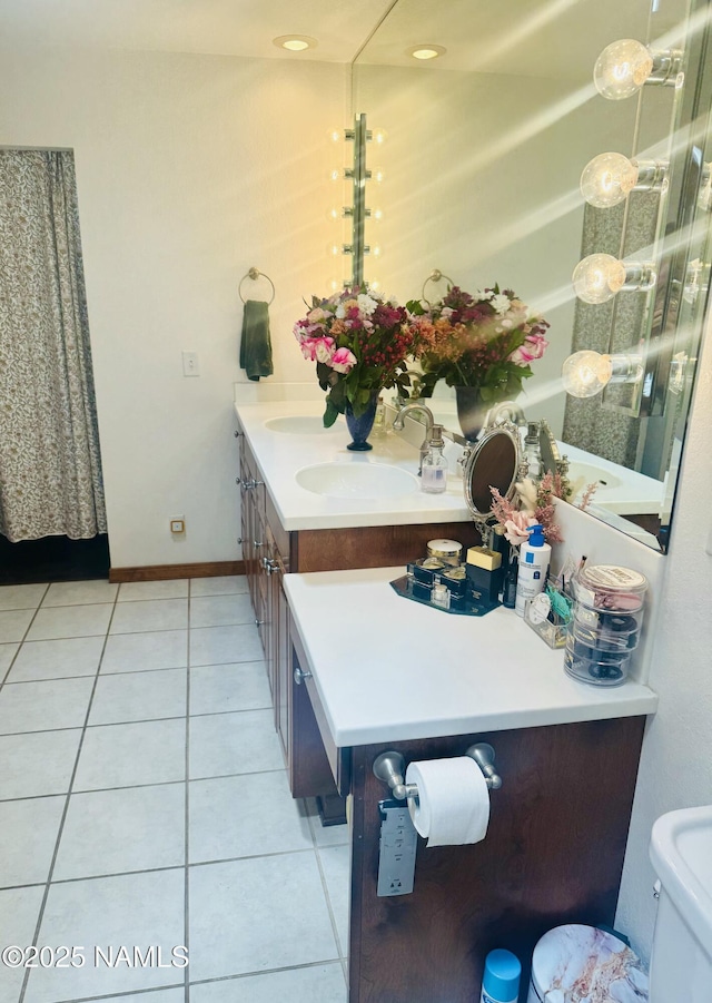 5070 N Weatherford Rd, Flagstaff, AZ 86001 - bathroom with double vanity and tile patterned floors